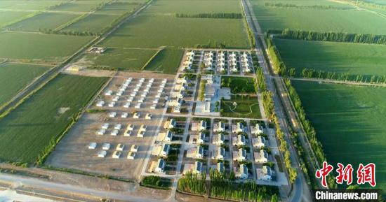 居住区被绿色环绕。(资料图) 林国强 摄